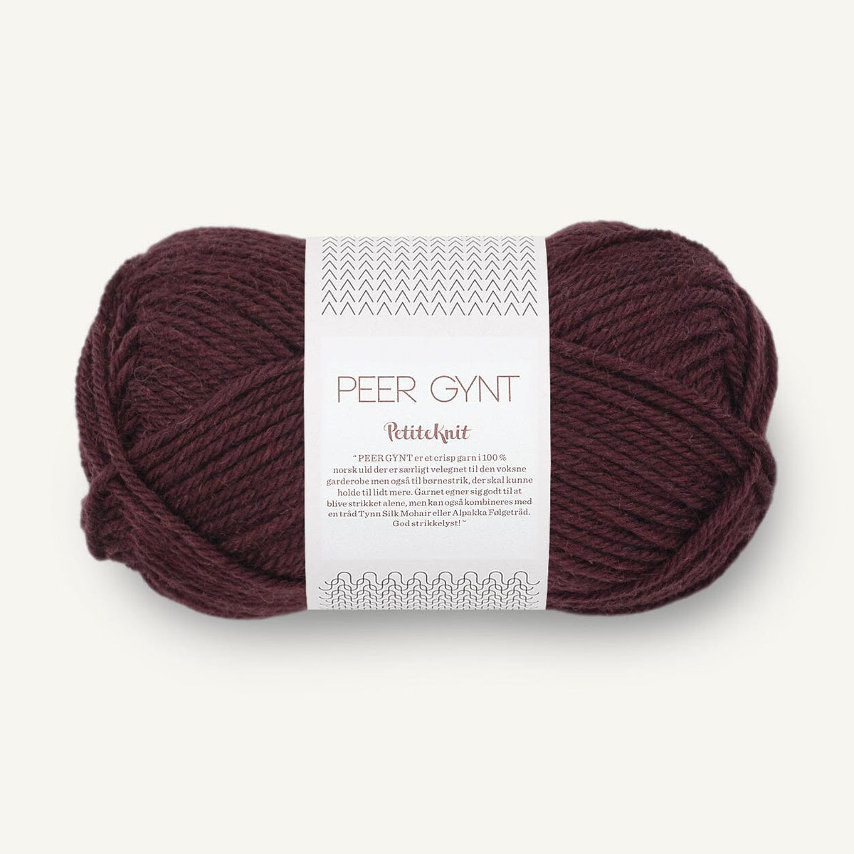 Ball of yarn with a label on a white background