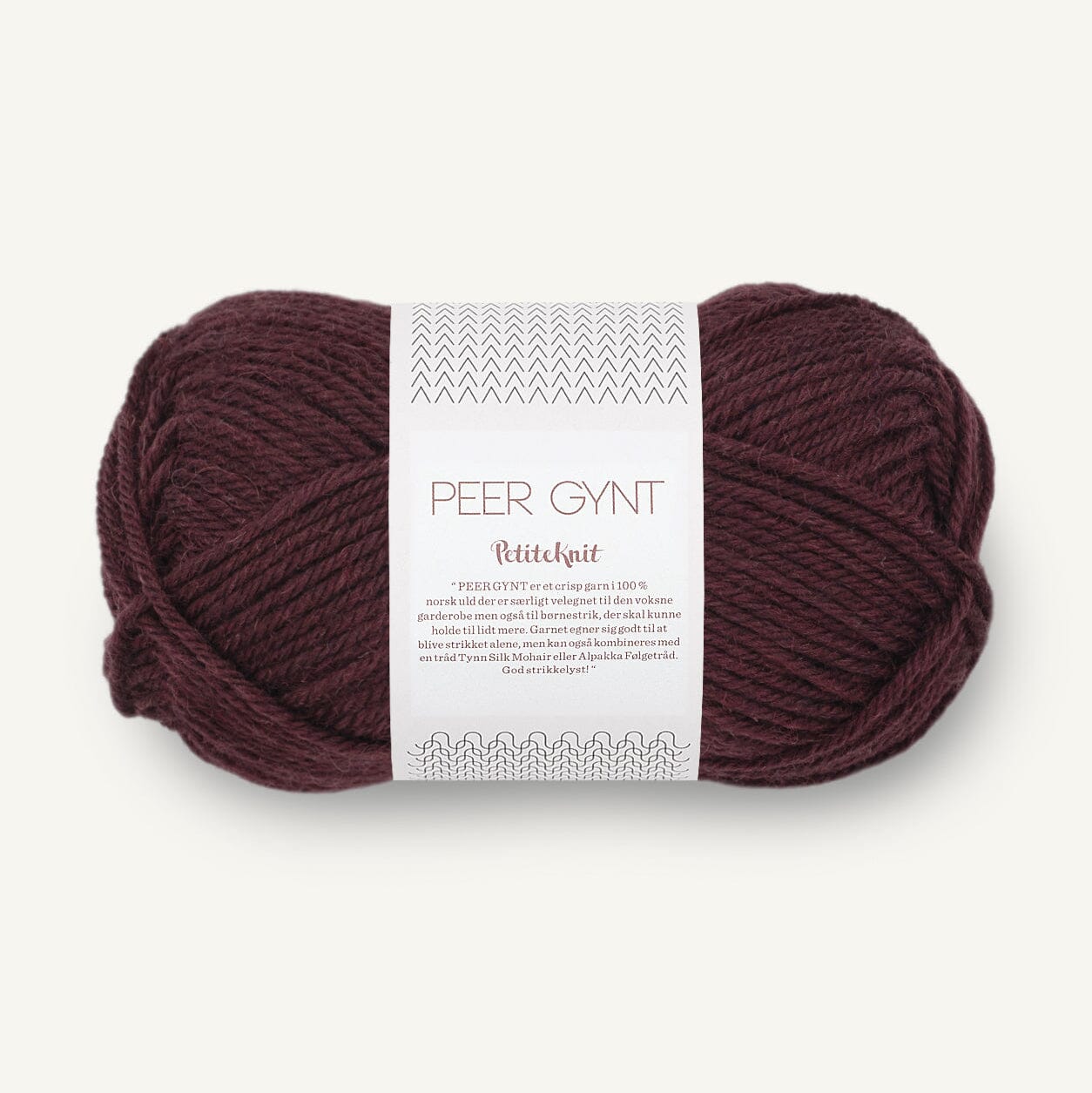 Ball of yarn with a label on a white background