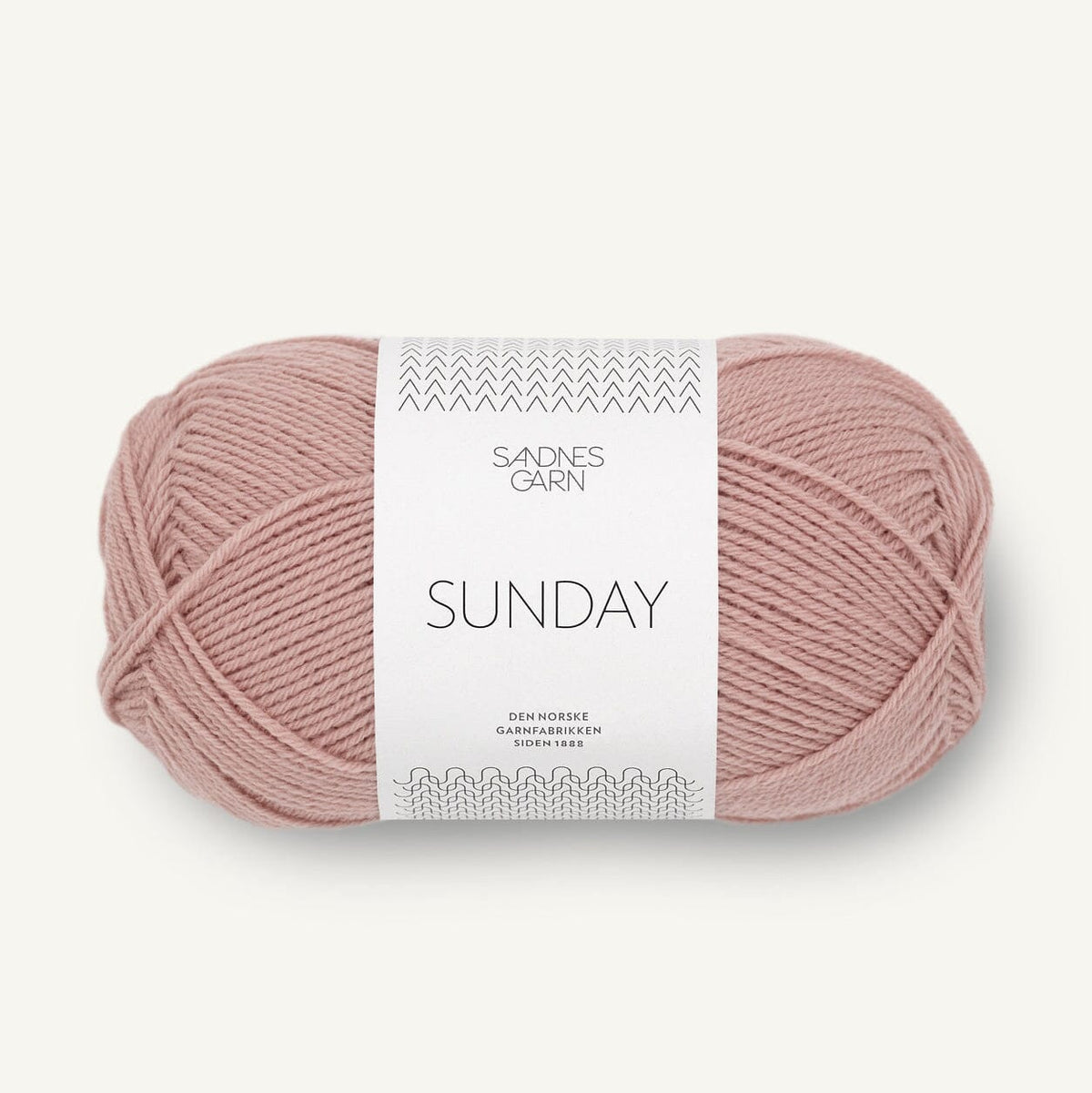 Ball of pink yarn with a &#39;Sundnes Garn Sunday&#39; label on a white background