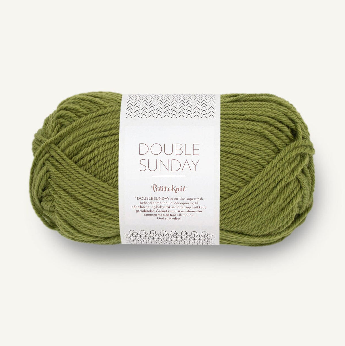 Green skein of yarn with a label on a white background