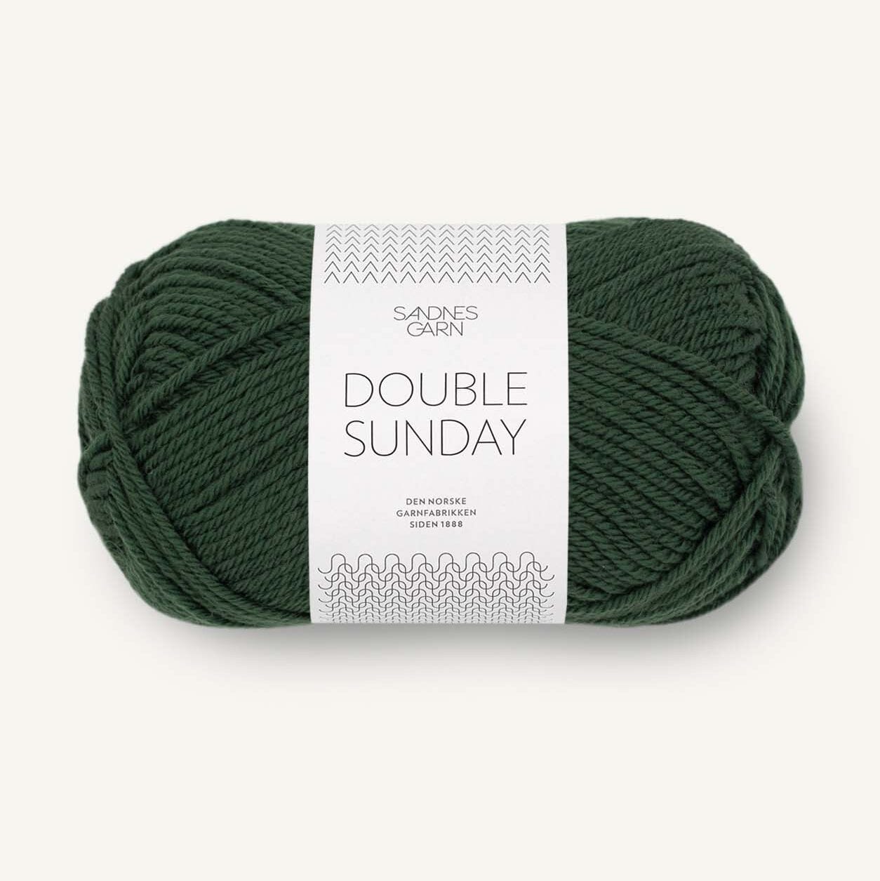 Green skein of yarn with a label on a white background