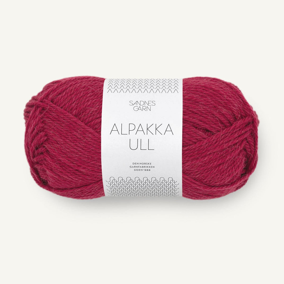 red alpakka yarn on white background