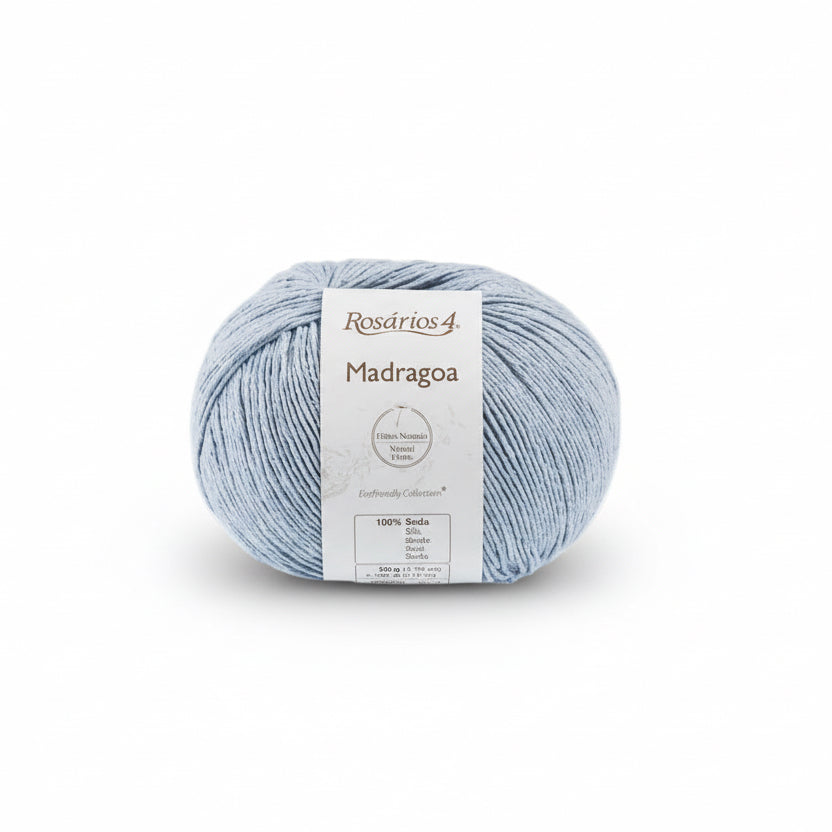 blue Ball of silk yarn with a label on a white background