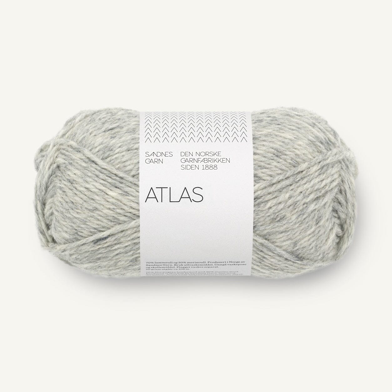 Ball of grey yarn with a label on a white background