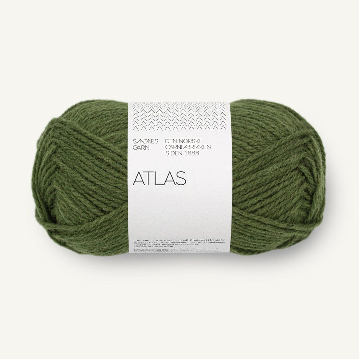 Green skein of yarn with a label on a white background