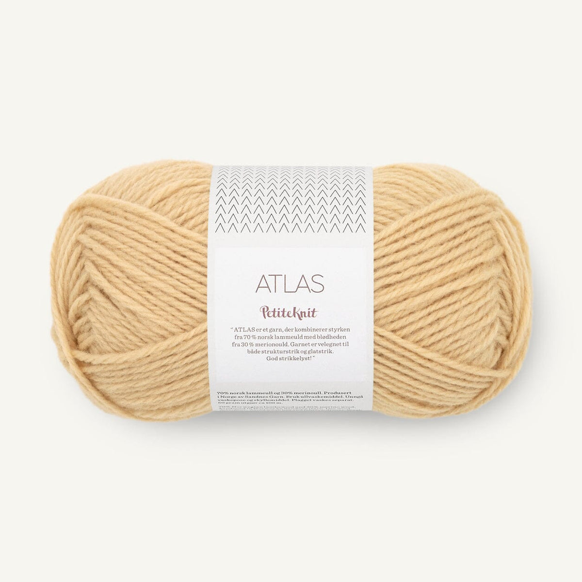 Ball of yellow yarn with a label on a white background