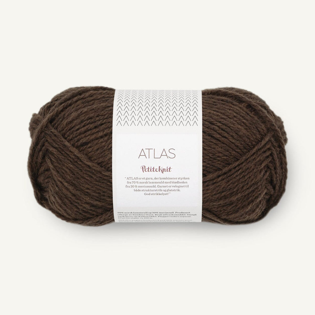 Brown yarn ball with a label on a white background