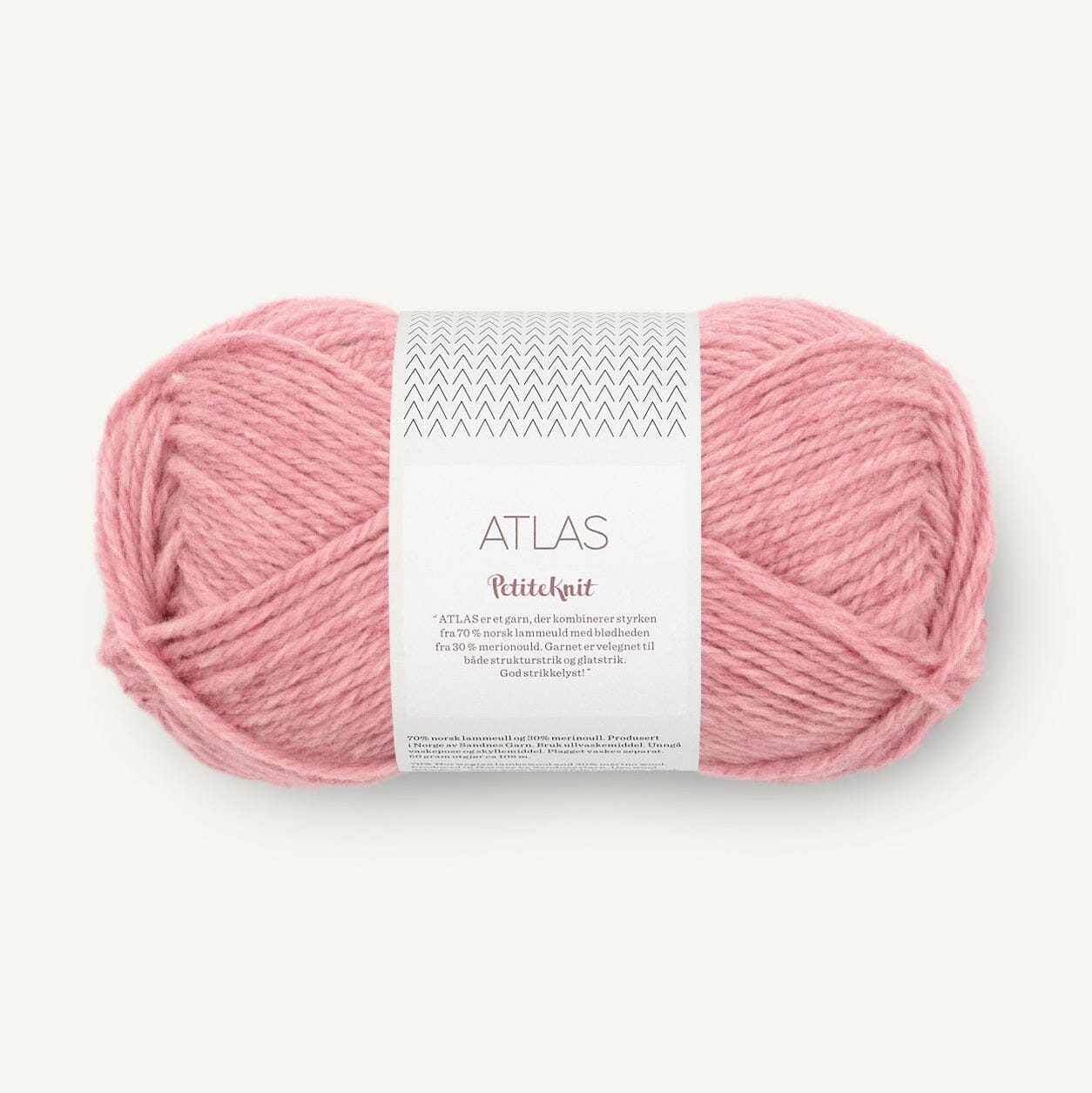 Pink skein of yarn with a label on a white background