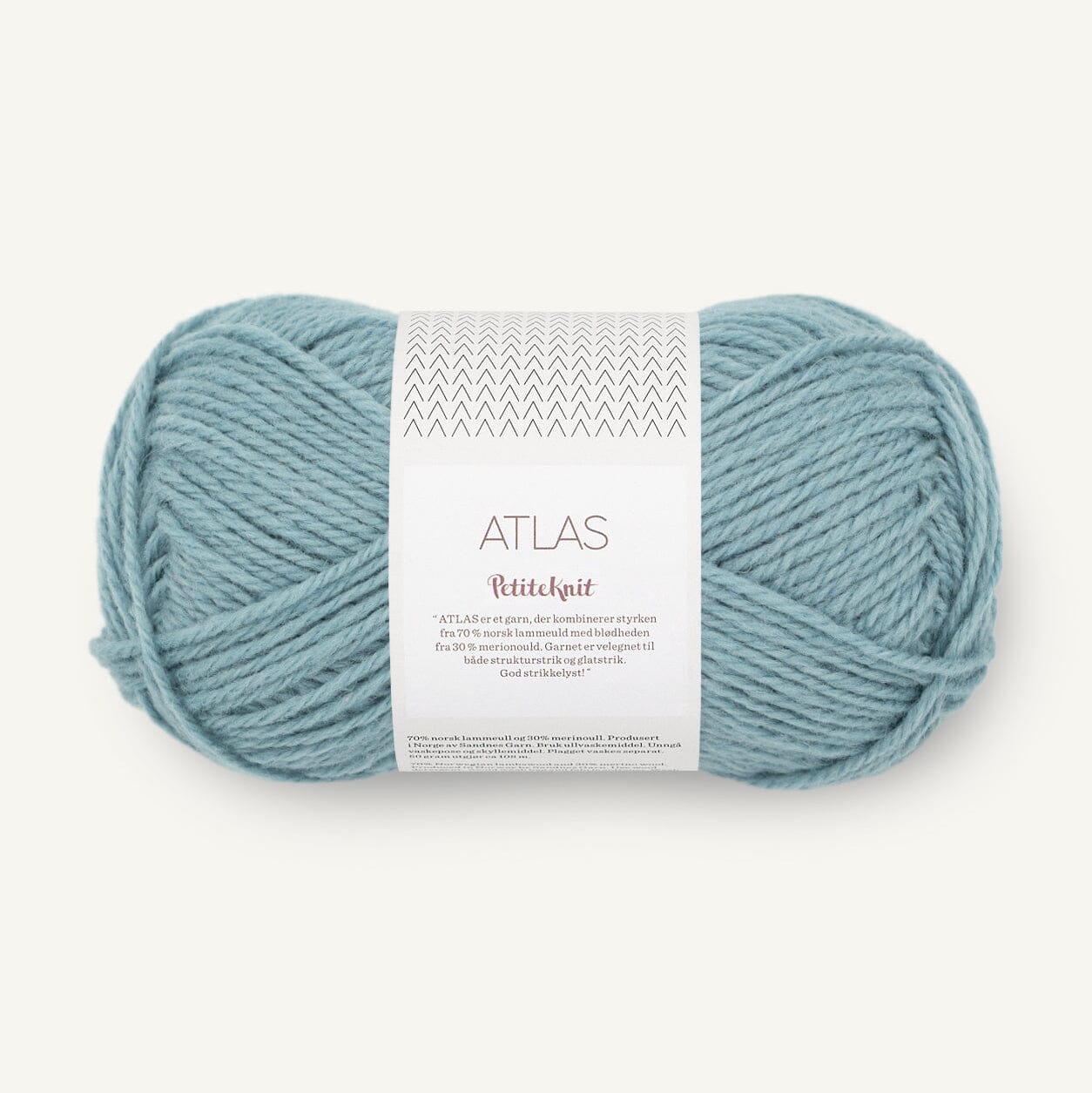 Ball of yarn with a label on a white background