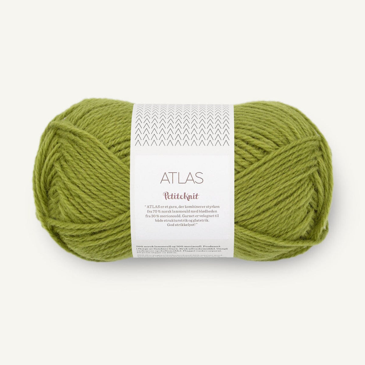Green skein of yarn with a label on a white background