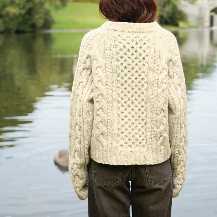 Woman wearing wilbur cable sweater