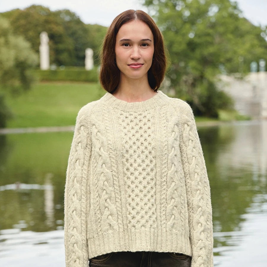 Woman wearing wilbur cable sweater