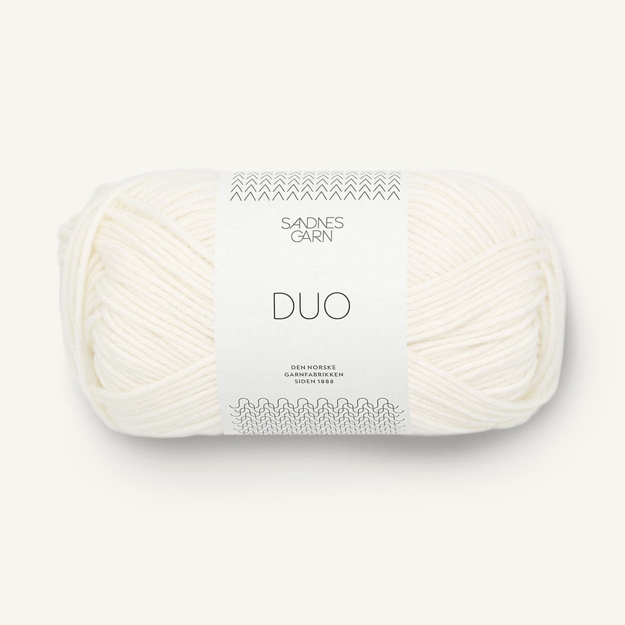 Five Balls of yarn in different colors with 'DUO' labels on a textured surface.