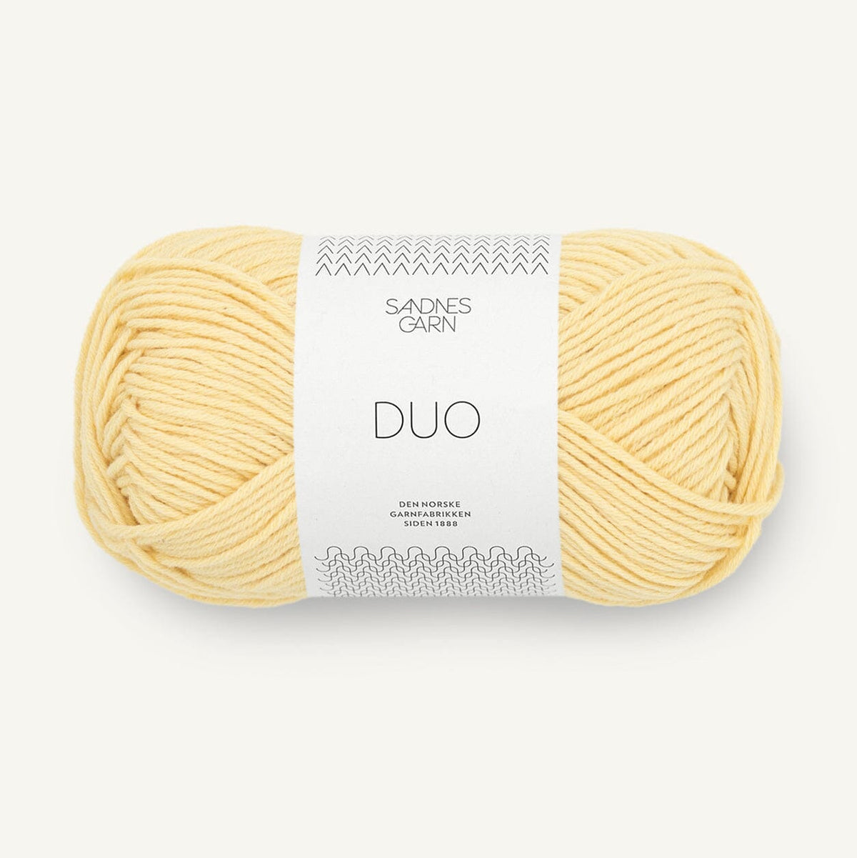 Ball of yellow yarn with a label on a white background