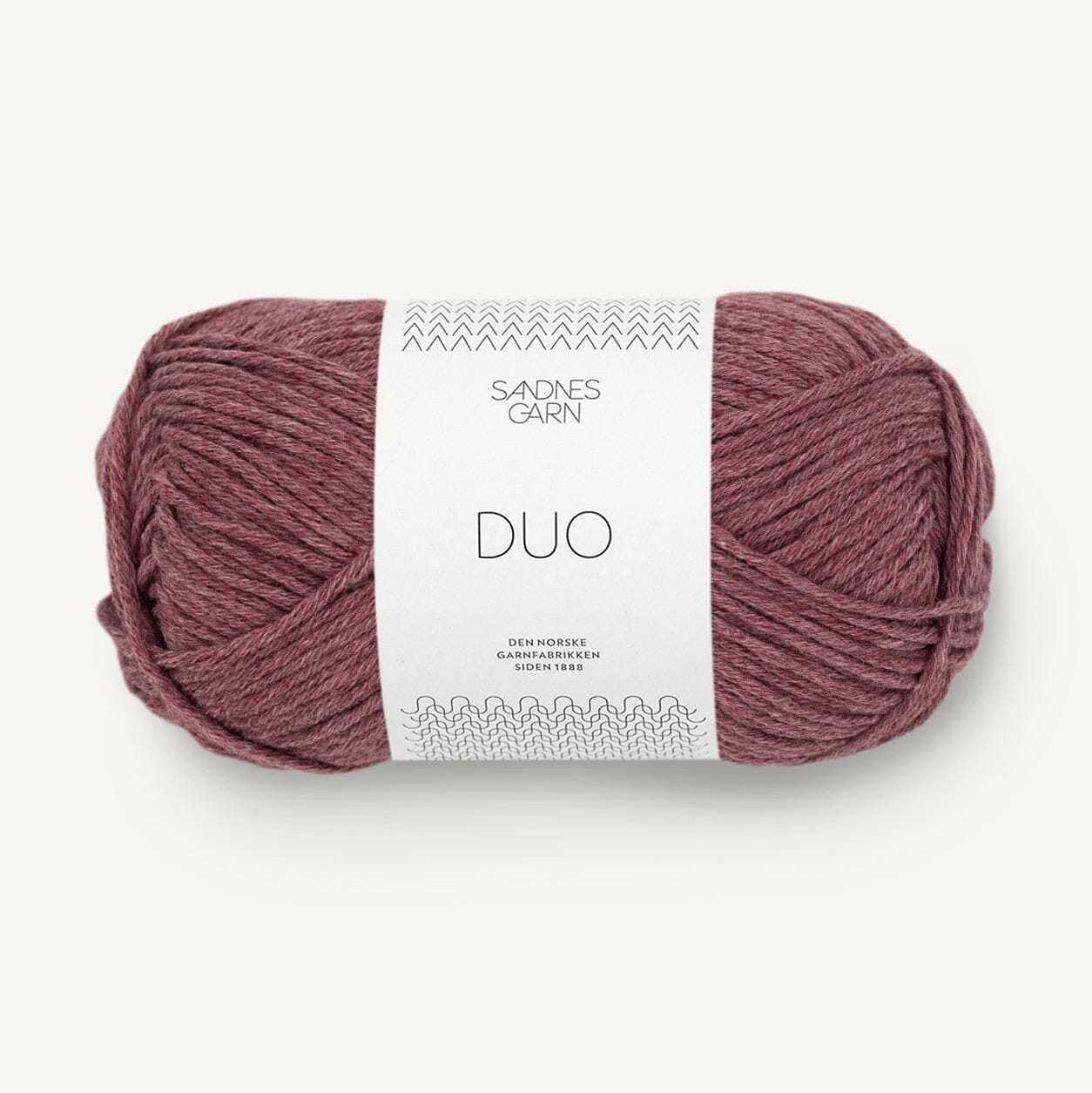 Ball of yarn with a label on a white background