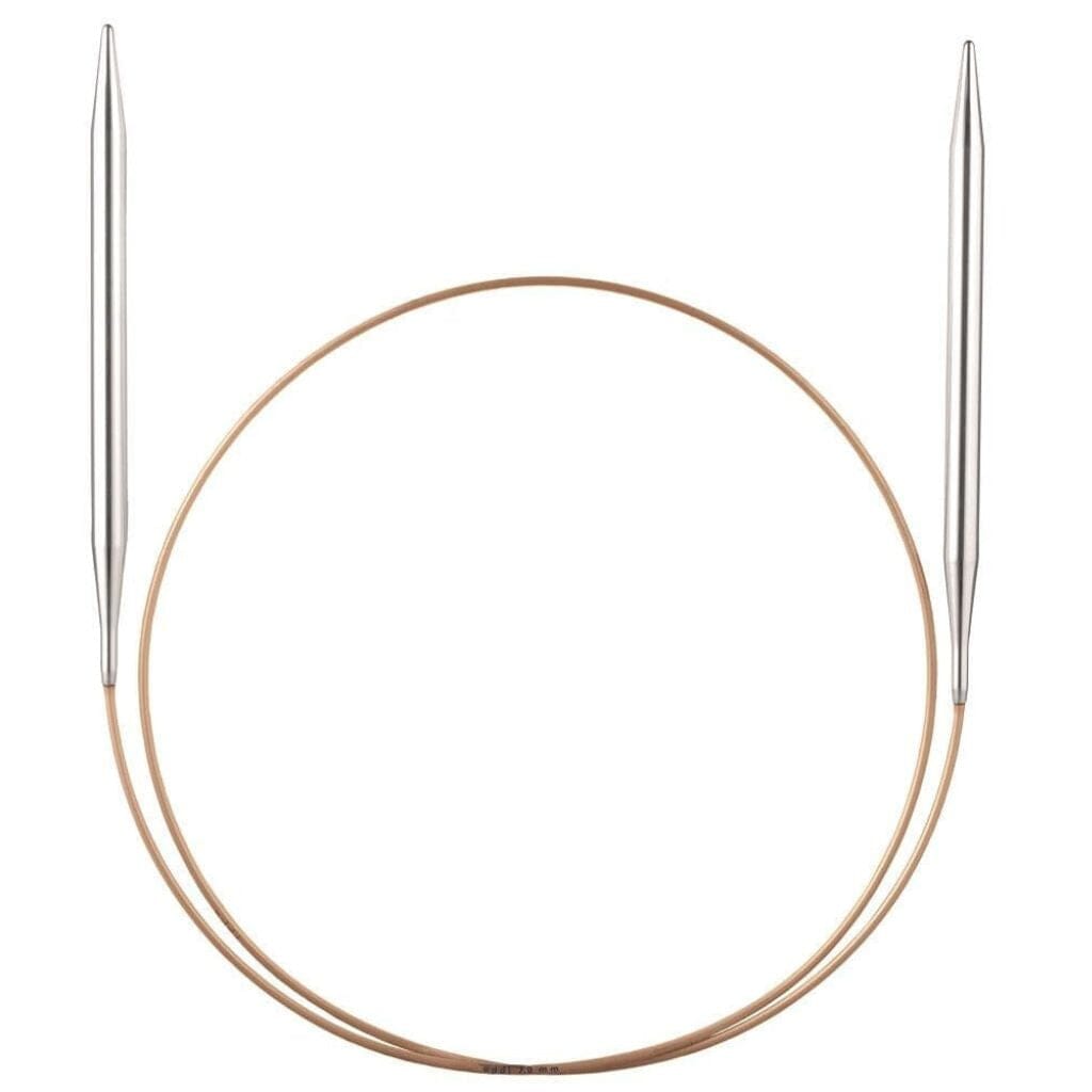 A pair of Addi circular knitting needles with lightweight aluminium tips, arranged in a circle.