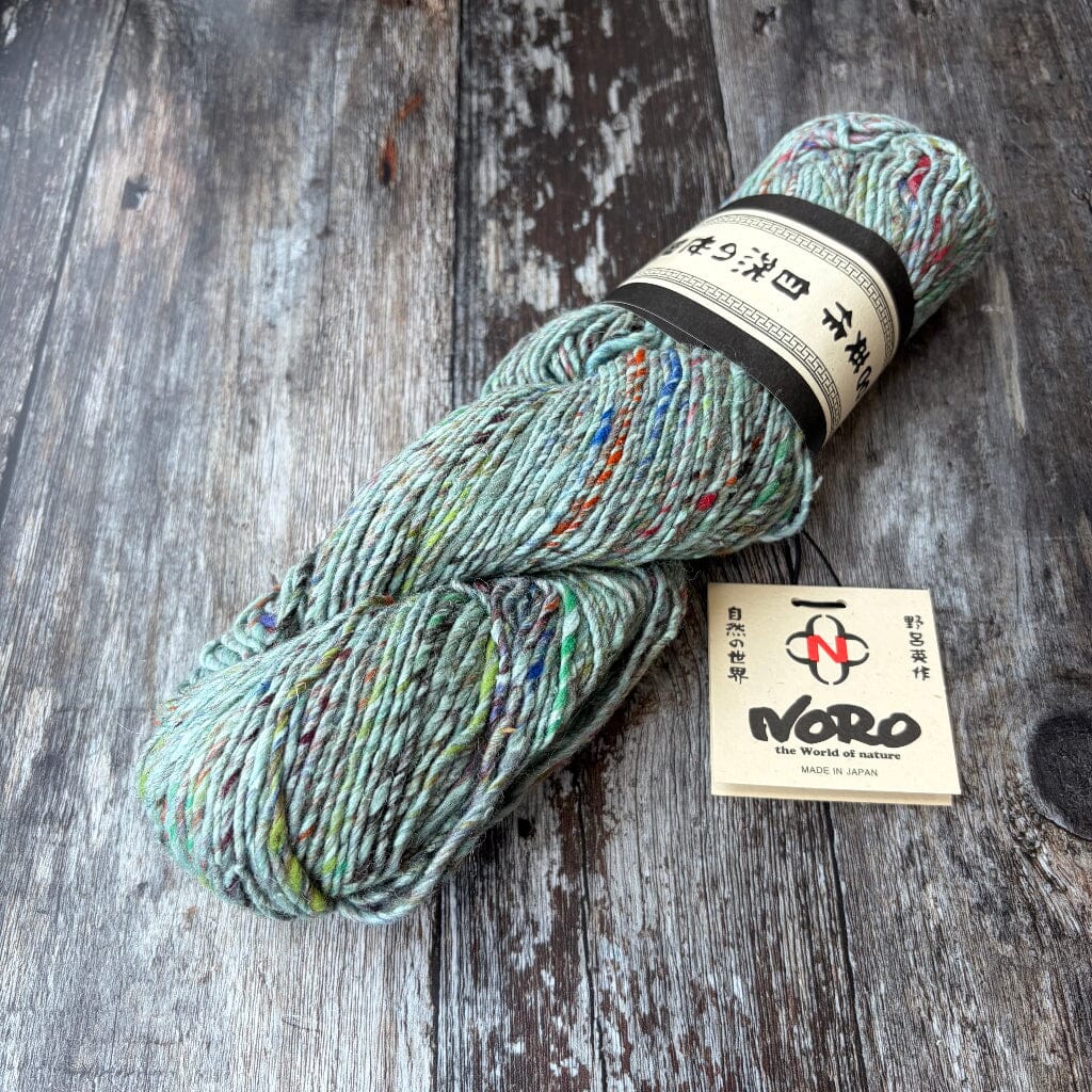 skein of yarn with a Noro label on a wooden surface