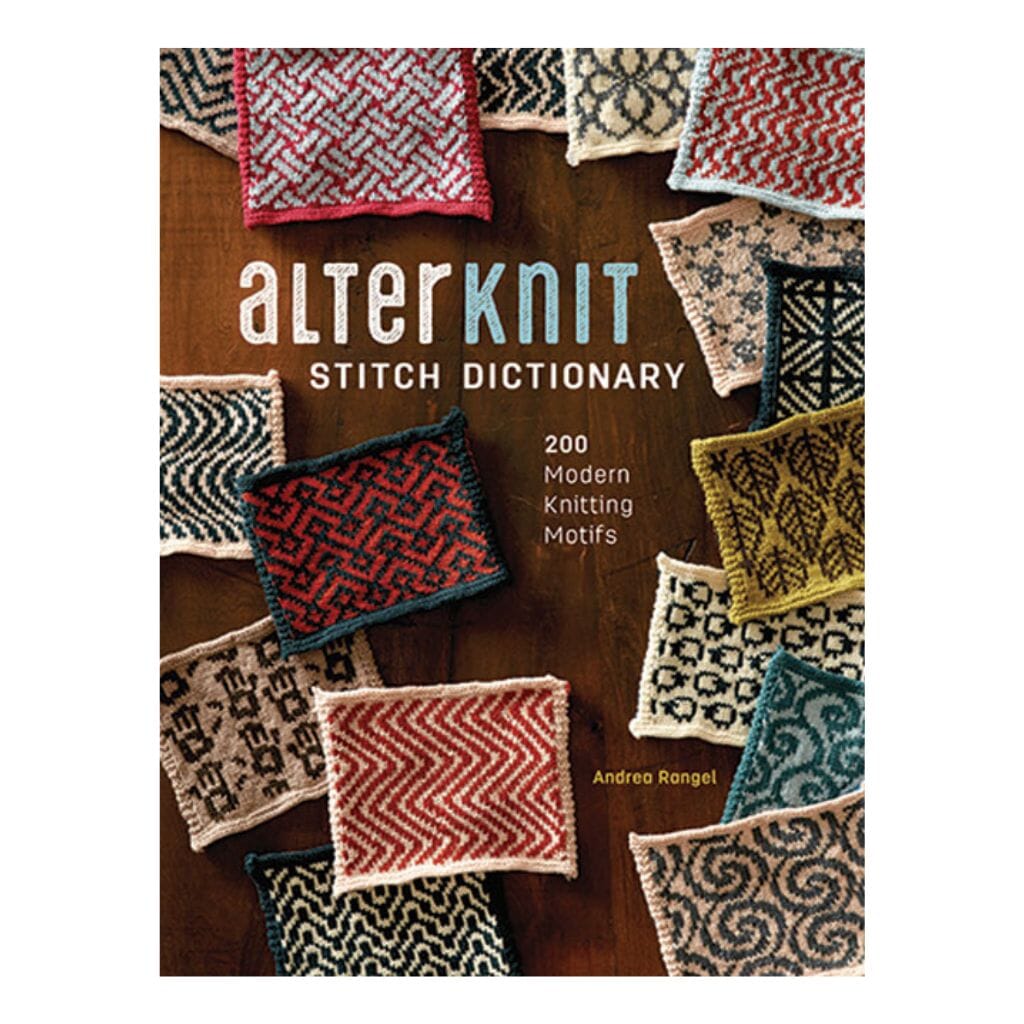 Book cover of 'Alterknit Stitch Dictionary' with knitted swatches on a wooden surface