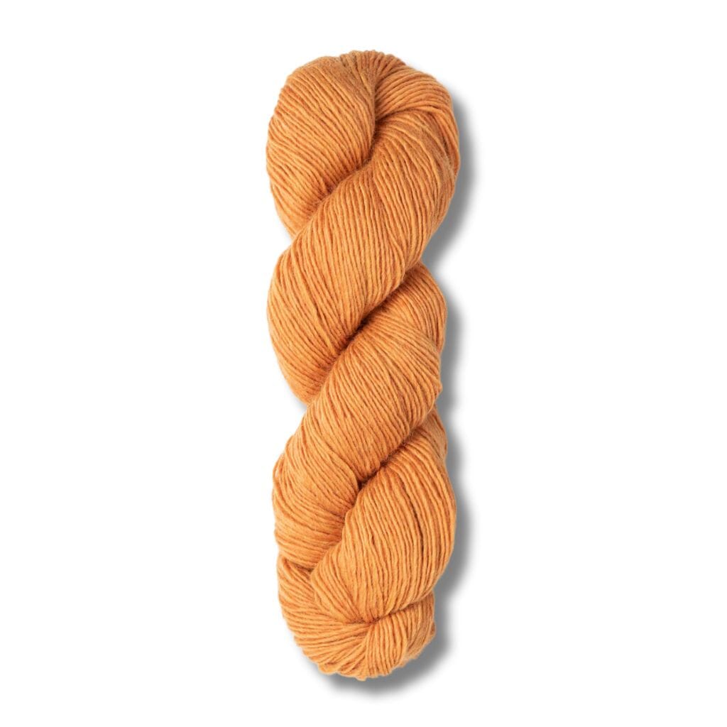 skein of Blue Sky Fibers Woolstok Light yarn in ember glow