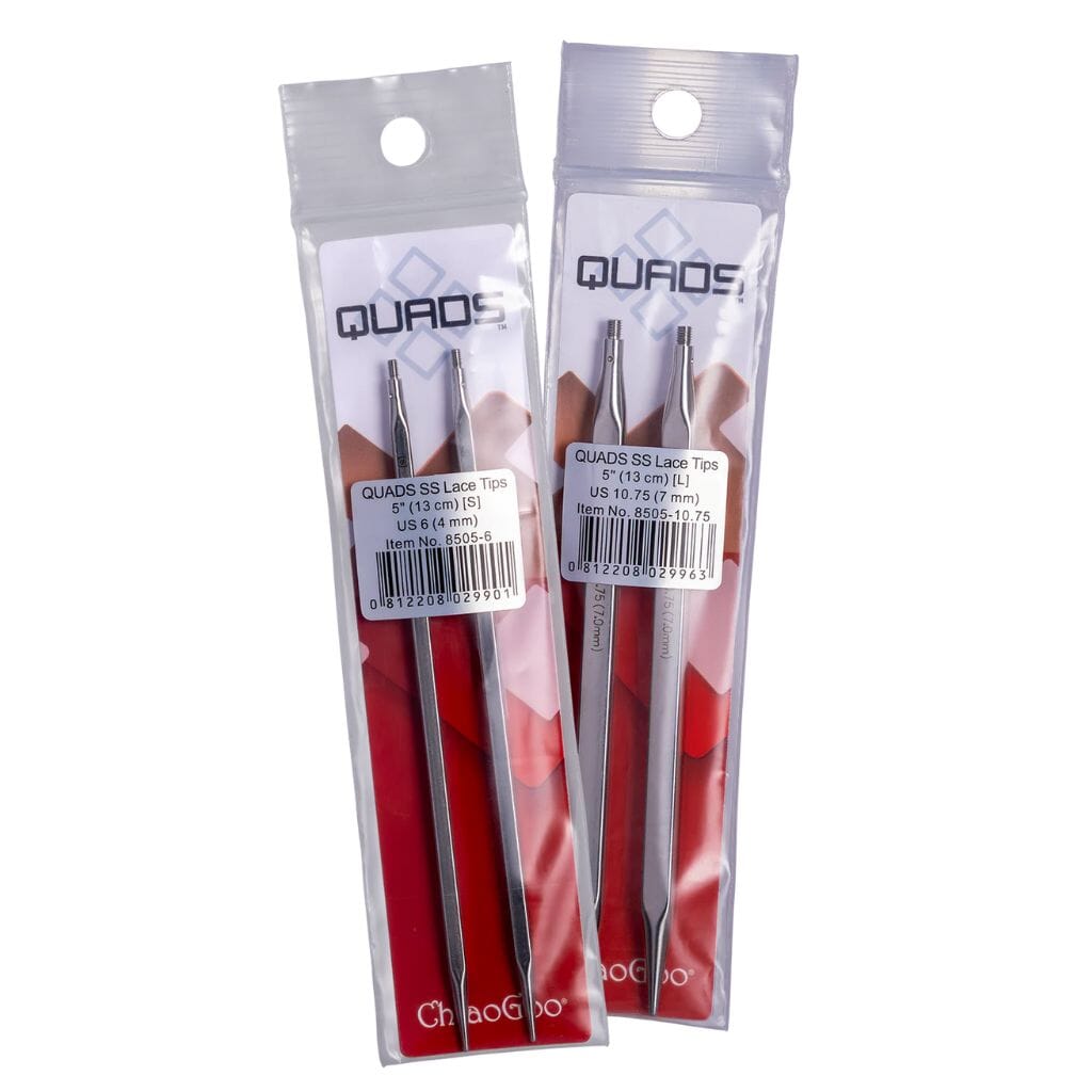Two packages of quads needle tips on a white background