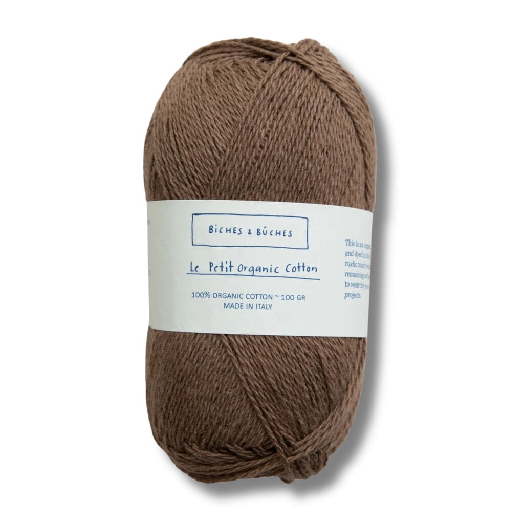 brown ball of cotton, biches&buches on label with a white background
