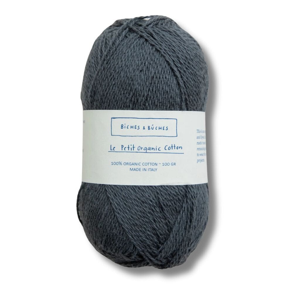 Dark Grey ball of cotton, biches&amp;buches on label with a white background