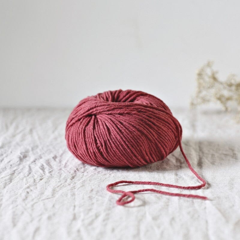 merino aran weight knitting yarn deep rose, de rerum natura cyrano