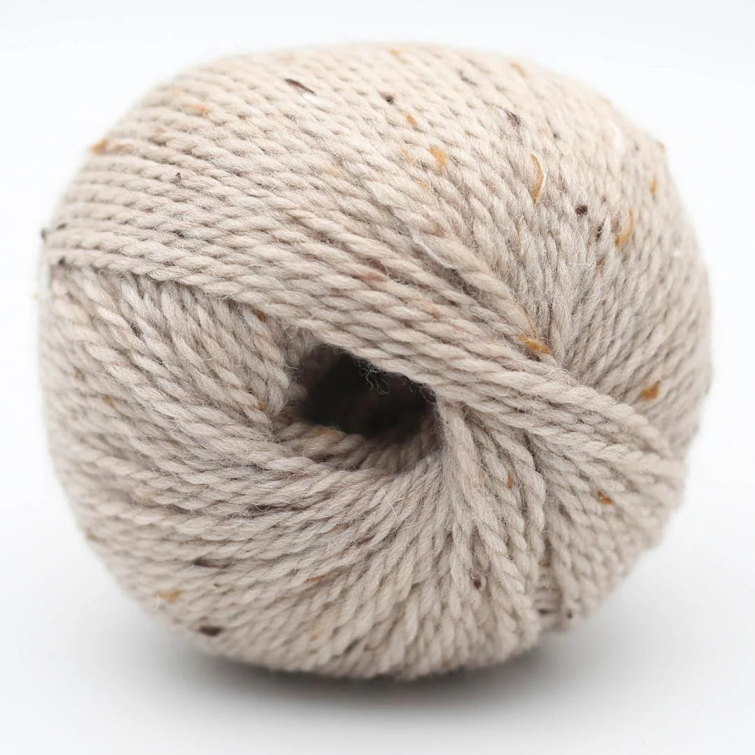 ball of beige tweed yarn