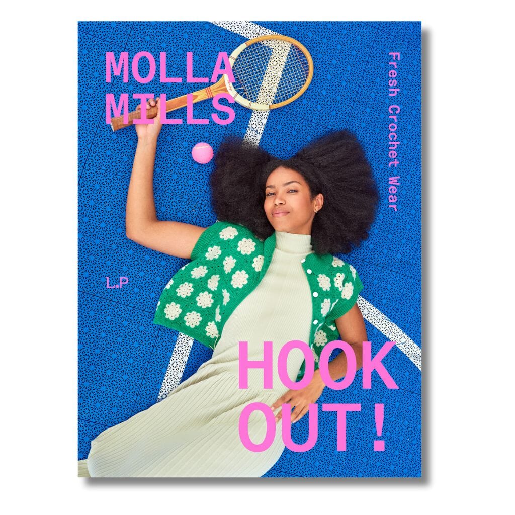 Book cover with a woman holding a crochet hook and yarn, featuring the text 'Molla Mills' and 'Hook Out!'.