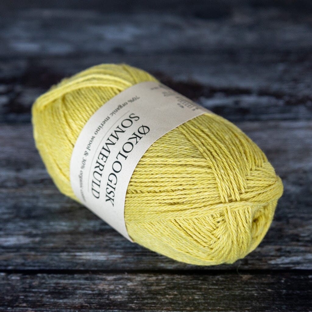 ball of yellow yarn, a blend of merino wool and cotton.