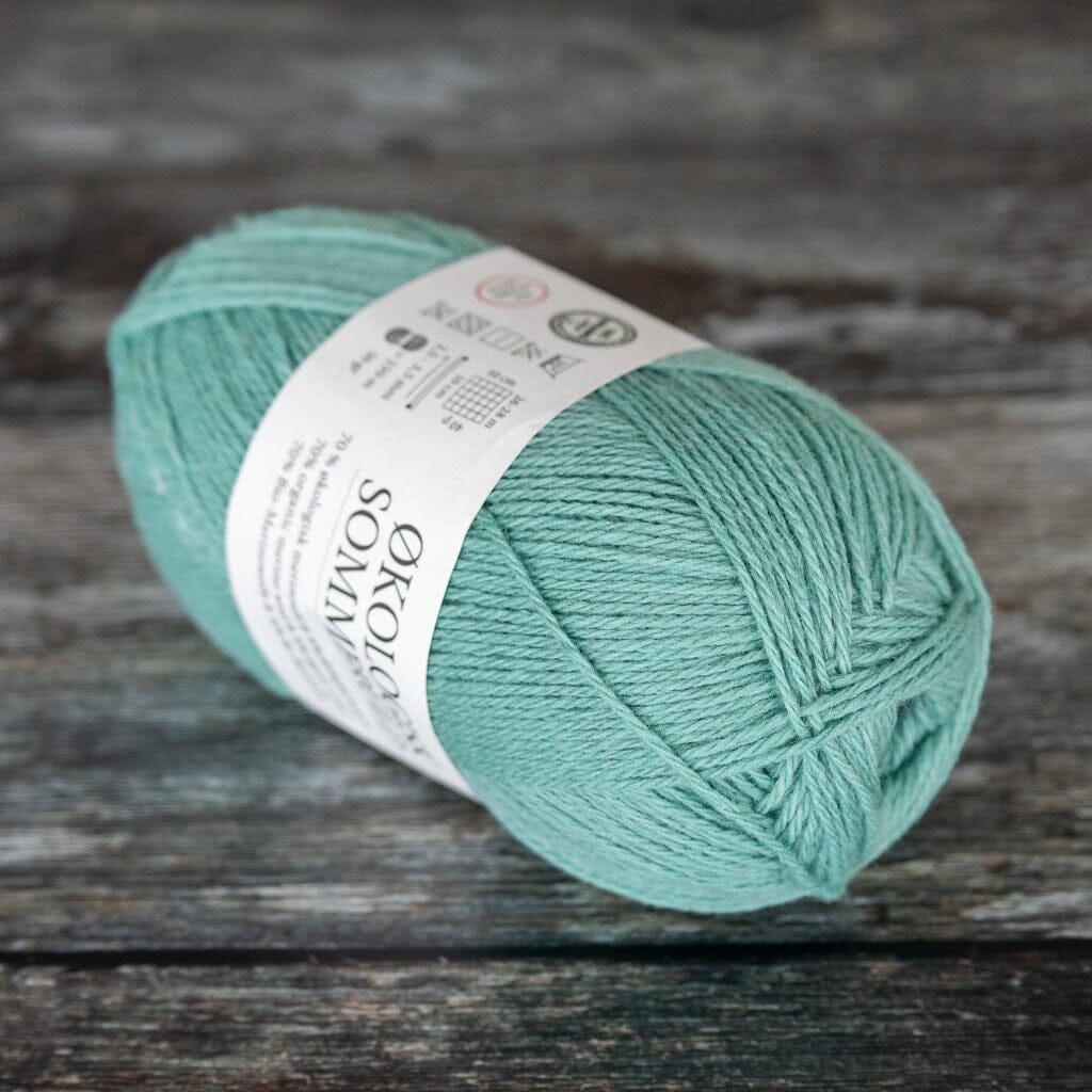 ball of blue/green yarn, a blend of merino wool and cotton.