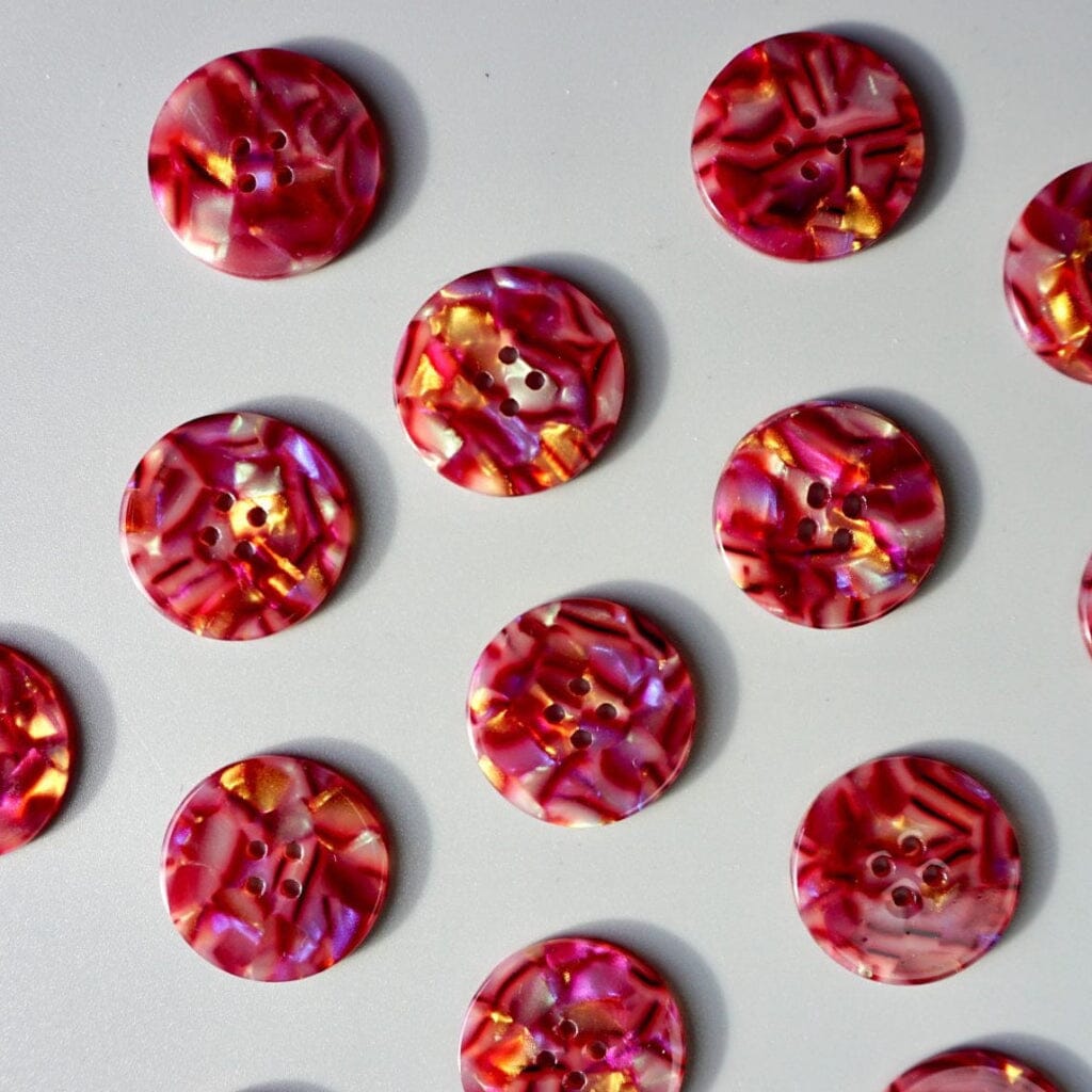 pink, burgundy and gold buttons