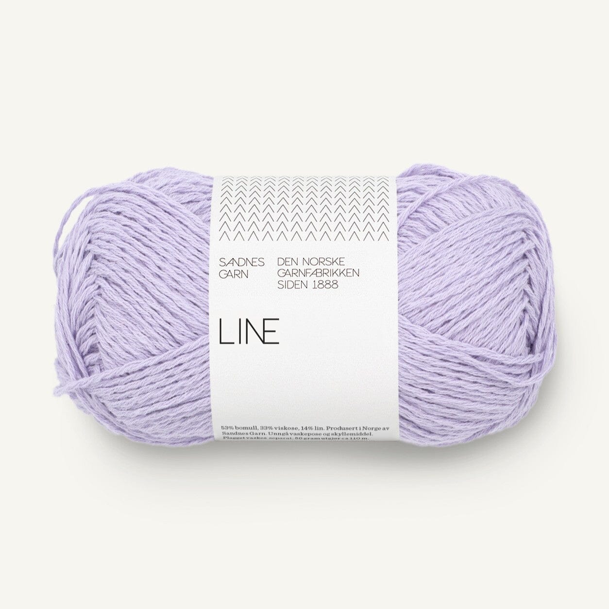 Ball of purple yarn with a label on a white background