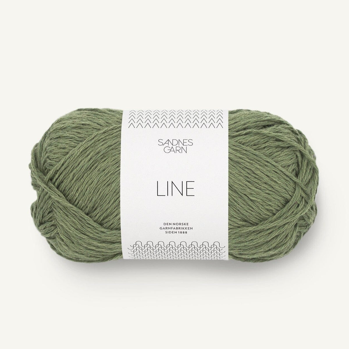 Green skein of yarn with a label on a white background