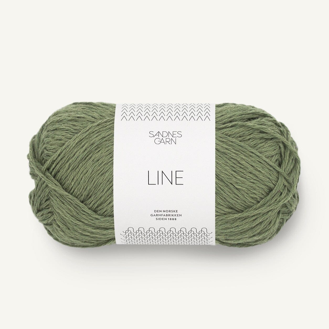 Green skein of yarn with a label on a white background
