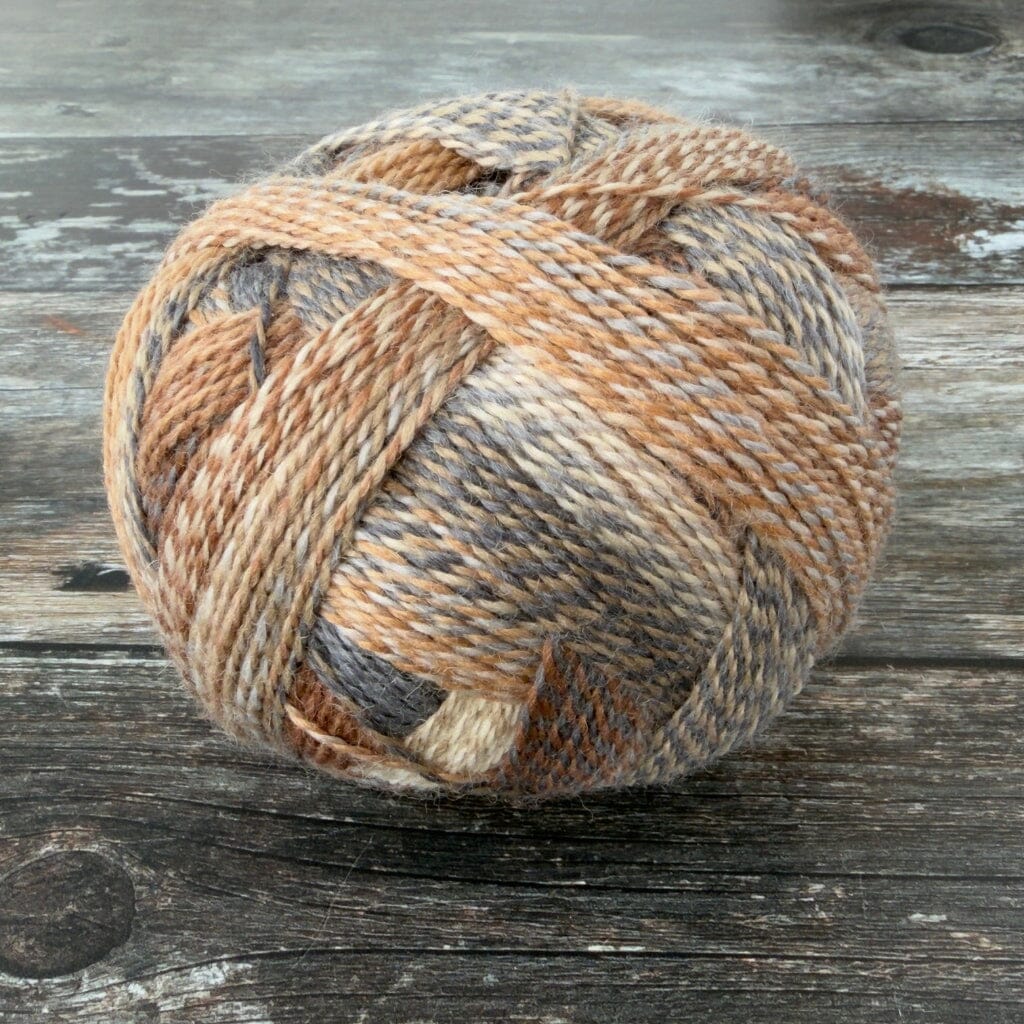 Ball of yarn on a wooden surface