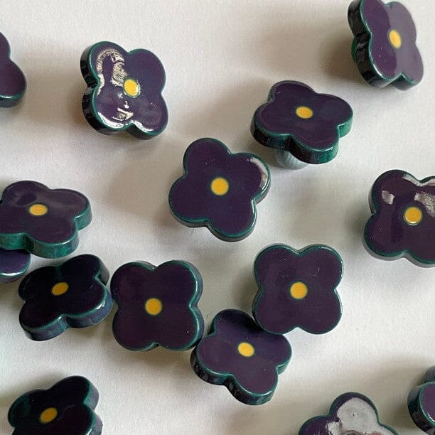 glossy navy flower buttons
mustard centre